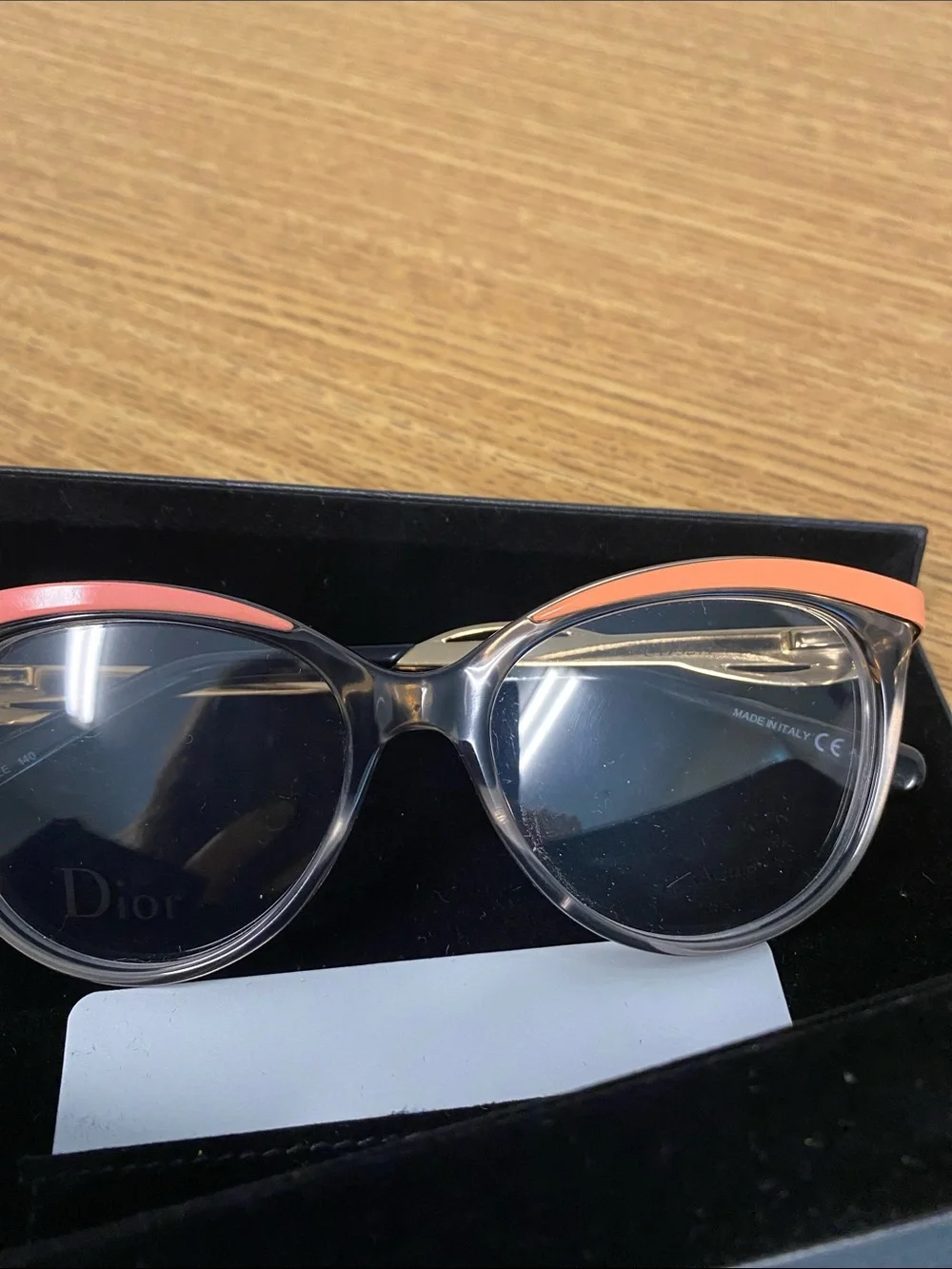 Dior Transparent Frame Cat-Eye Glasses with Coral Accents